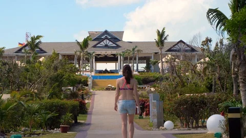 Walking up a resort path in Cuba Cayo Santa Maria Feb 20th 2018 Stock Footage 87093140