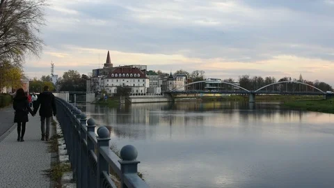Walking on the river in the city at the sunset.  Stock Footage 119922194