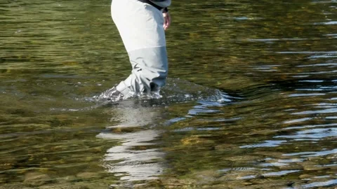 Walking by the river with the water on the knee 動画素材 137155148
