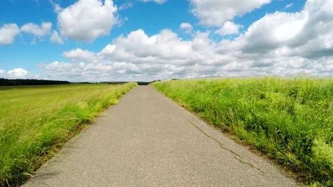 Walking on the road Stock Footage 76965873