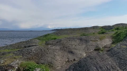 Walking on to the rocks at Cattle Point Vídeo Stock 190817218