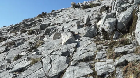 Walking on the rocks Stock Footage 28122939