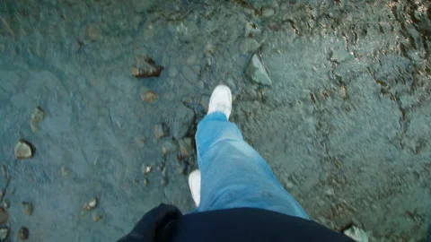 Walking on rocks Stock Footage 246880382