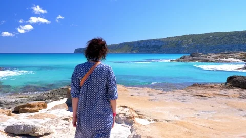 Walking on rocky beach Stock Footage 111268350