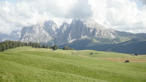 Walking on rolling meadows of Seiser Alm Stockbeeldmateriaal 150395542
