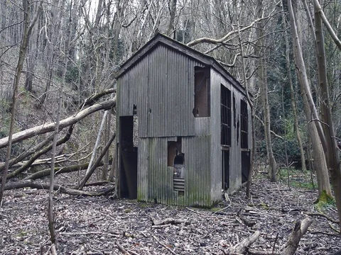 Walking into an ruined hut. Stock Footage 106677627