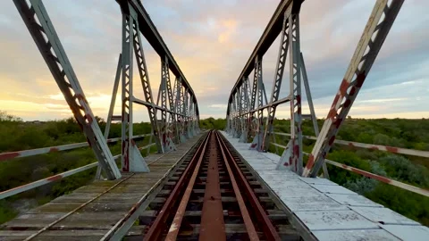 Walking on rusty iron bridge Stock Footage 221124926