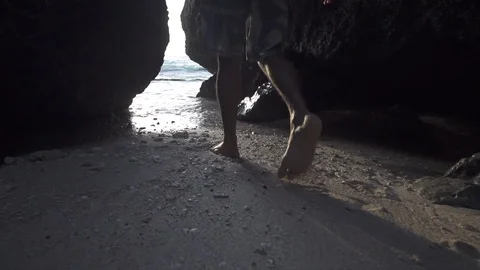Walking in Sand in Beach Cave Stock-Footage 106153054