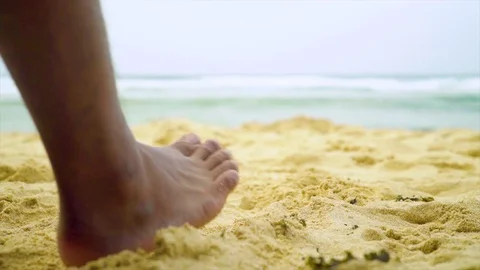 Walking on the sand beach Stockbeeldmateriaal 103495851