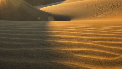 Walking on a sand dune during sunset. Camera moving along big sand dune in the 스톡 동영상 123970092