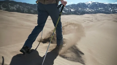 Walking Sand Dune Ridge-line Sand Exploding in Step in Sand Dunes National Park Video stock 106073091