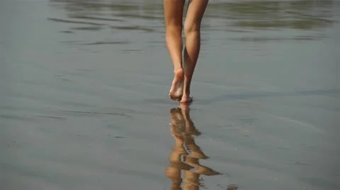 Walking on the sand Stock Footage 10792050