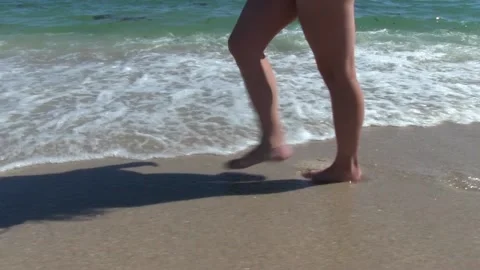 Walking on sand Stock Footage 142382491