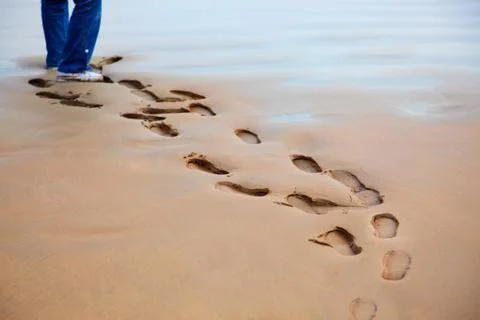 Walking on the sand Stock Photos