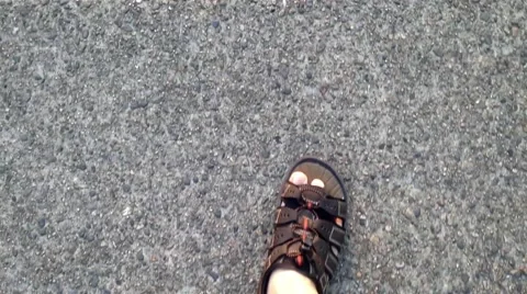 Walking in sandals on sidewalk Video stock 50664306