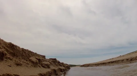 Walking by sandy shore Stock Footage 25208184