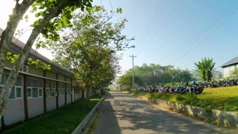 Walking in the school complex to the parking lot 스톡 동영상 243019805