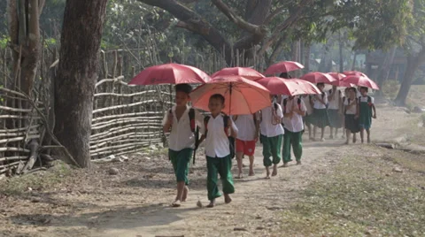 Walking to School with Umbrellas Stock Footage 37350766