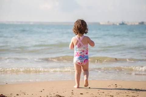 Walking into the sea 写真素材