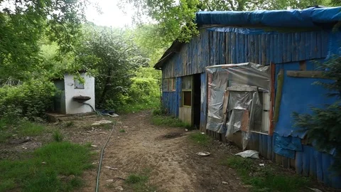 Walking to a shed Stock Footage 93555361