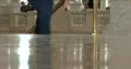 Walking On Shiny Refelctive Floor HD Footage