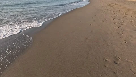 Walking on the shore of a sandy beach Stock Footage 285231914