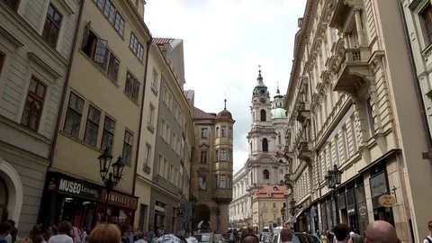 A walking shot down a old town Prague street looking up at the building facades Stock Footage 85365170