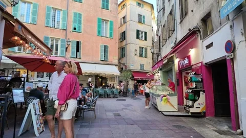 Walking shot through busy old town pedestrian streets Stock Footage 336922613