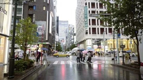 Walking in Side Street Turning into Main Street of Ginza District in Tokyo Stock Footage 104472861