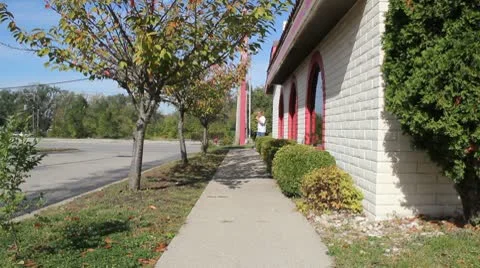 Walking on a sidewalk 動画素材 8916144