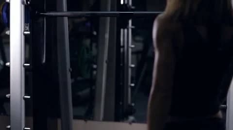 Walking to smith machine. Slow motion Stock Footage 64316188