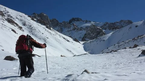 Walking on snow-covered mountains Stock Footage 60065986