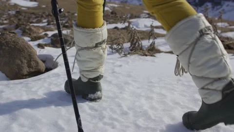Walking on snow Stock Footage 138508415