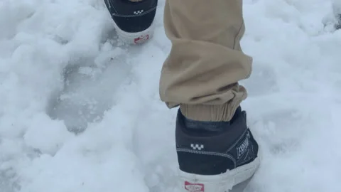 Walking in Snow Stock Footage 235385438