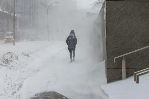 Walking in a snowstorm Stock Photos