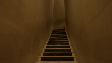 Walking up staircase inside Xa Loi stupa at Bai Dinh Temple Spiritual and Cul Stock Footage 128221538