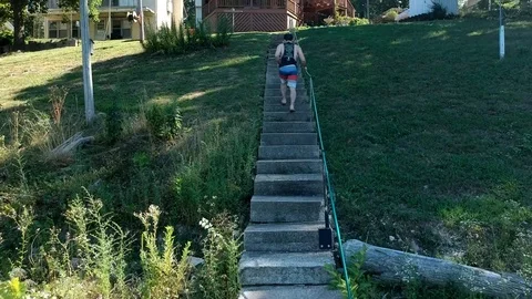 Walking up stairs at the Lake Video stock 102477648
