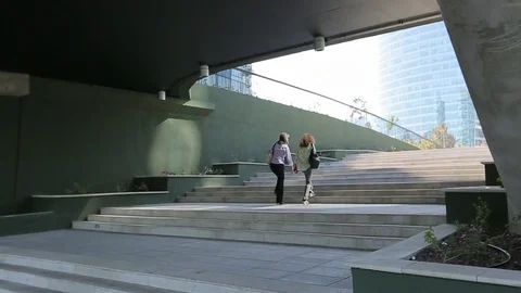 Walking up stairs outside building Stock Footage 77052169