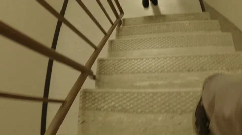 Walking up a stairwell Stock Footage 37038243