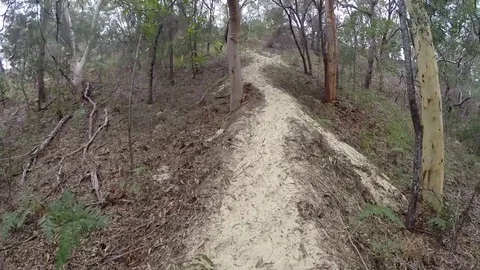 Walking up a steep sand dune on Fraser Island Stock Footage 71477713