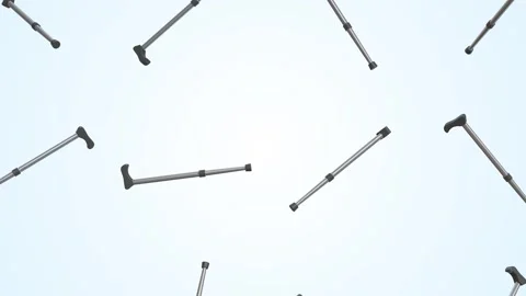 Walking Sticks Falling on a Light Background. Walking Canes 3D Animation. 4K Stock Footage 295775868