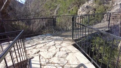 Walking on the stone road and bridge in the historic district. Stock Footage 229824454