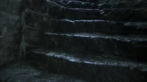 Walking up stone steps of Medieval Castle fort Stock Footage 128665852