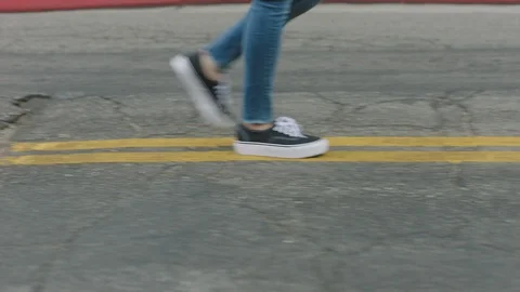 Walking, stopping, then speeding up- walking steadicam Stock Footage 127636841