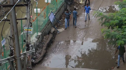 Walking-in-the-street-after-rain Stock Footage 117461860