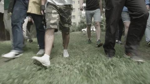 Walking street footbal hooligans going to legs foots Stock Footage 51728225