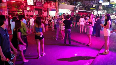 Walking Street is red-light district with many restaurants, go-go bars, brothels Video stock 37894273