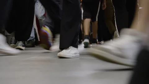 Walking Student's Feet in a Busy High School Hallway Stock Footage 304108268