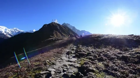 Walking with the sun on Himalayas Video stock 236393693