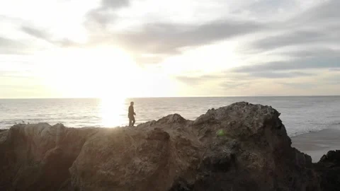 Walking into Sunset at Beach Video stock 297229028